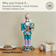 Nutcracker figure on display base, teal uniform, purple legs, striped hat, holding tree