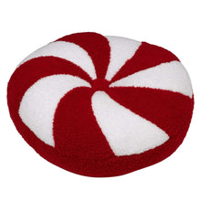 Round peppermint striped decorative pillow with red side and white ribbons