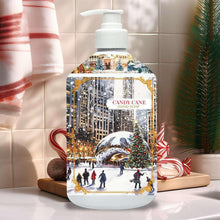 Holiday hand soap bottle with white pump and Candy Cane label over winter street scene