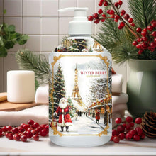 Holiday hand soap bottle with white pump and Winter Berry label over snowy street scene