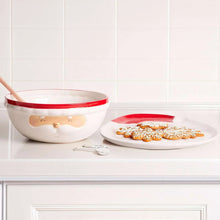 Santa-themed serving bowl and platter set with red-rim face design and cookie topper