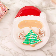 Santa face serving platter with red hat and green tree cookie on white dish
