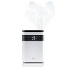 Ultrasonic humidifier releasing visible mist plume with digital display