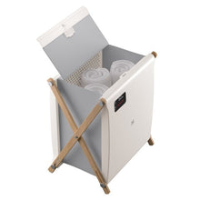 XL towel warmer with open lid showing stacked white towels