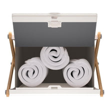 XL towel warmer with three rolled white towels inside, front open