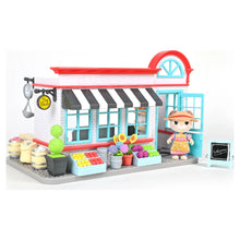 General store dollhouse playset with doll figure, red roof and blue window frames