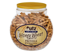 Honey wheat twisted pretzels in glass jar with yellow lid, front label visible