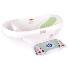 White baby bathtub with removable sling insert and green interior panel