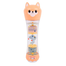 Orange fox rainstick rattle with clear tube and stacked colorful pieces