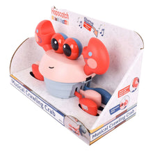 Musical crawling crab toy in retail box, red crab with pale pink head and blue base