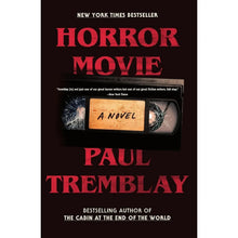 Paperback horror novel with black cover, red title lettering, and central book design