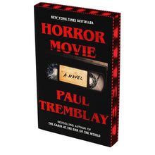 Paperback horror novel showing black cover with red title and Paul Tremblay name