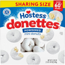 Sharing size bag of powdered mini donuts with white sugar coating and small donut shapes