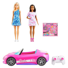 RC convertible car with 2 Barbie dolls; pink car, blue and pink dresses
