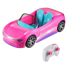 Pink Barbie RC convertible car with teal interior and handheld white controller