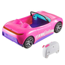 Pink Barbie RC convertible car with turquoise seats and handheld white controller