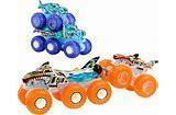 Orange monster truck toy with a stack of blue wheels and black tires