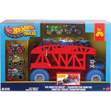 Monster truck hauler set in box, with red trailer, blue wheels, and multiple mini trucks
