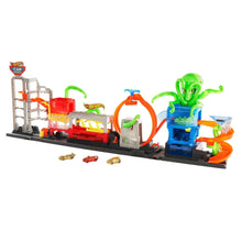 Hot Wheels Color Reveal car wash playset with green octopus and toy cars on base.