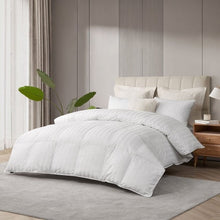 White down comforter with channel-quilted top layer