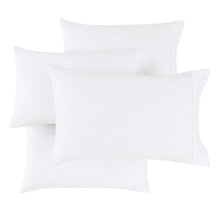 Set of white pillowcases and shams with smooth, crisp fabric