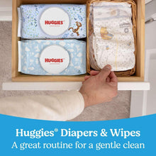Huggies Natural Care baby wipes packs in blue and patterned designs