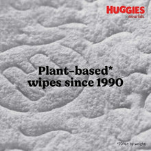 Plant-based baby wipes texture close-up, embossed wipe surface