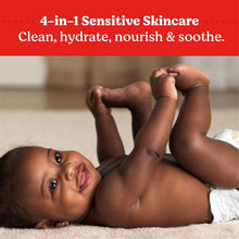 Baby lying on the floor while being cleaned with baby wipes by a caregiver