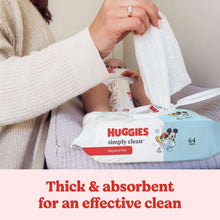 Baby wipes pack during diaper care while a person cleans an infant