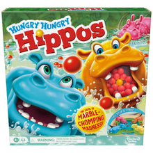 Hungry Hungry Hippos board game box with colorful hippos and marbles graphic
