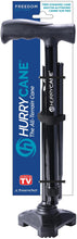 Folding cane with black T handle and black wrist strap, folded for portability