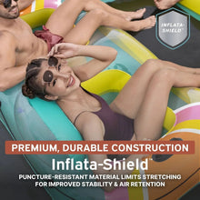 People relaxing on an inflatable party island with durable, puncture-resistant material
