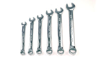 Six silver combination wrenches with open and box ends, size markings on shafts