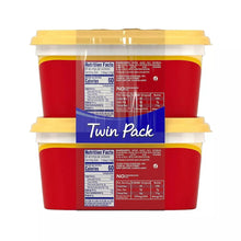 Original spread twin-pack tubs with nutrition facts panels on back, yellow lids