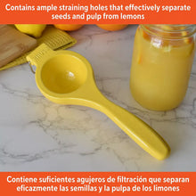 Yellow lemon squeezer with straining cup and extended handle