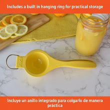 Yellow lemon squeezer with built-in hanging ring and long handle