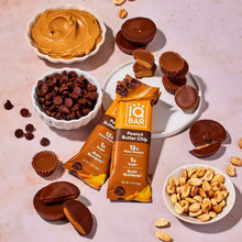 Peanut Butter Chip plant protein bar with chocolate cups, pieces, and peanuts