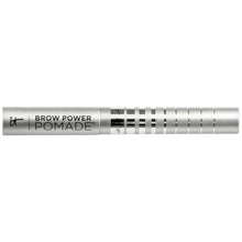 Brow pomade dispenser with silver barrel and black cap, label strip visible.