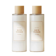 Two toner bottles with gold caps and label text on white bottles