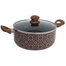 Talavera-style ceramic dutch oven with glass lid and wood-look handles, blue patterned body