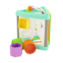 Baby activity triangle shape sorter in teal and white with orange, purple, and green pieces