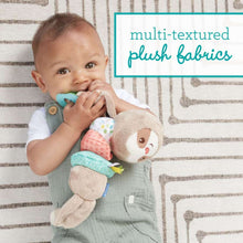 Baby cuddling plush sloth toy with multi-textured fabrics and teal teether