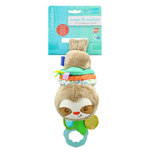 Plush music-and-motion sloth toy hanging with colorful bands and teal crinkle leaf