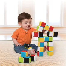 Stacking blocks set, multicolor cube blocks as a child plays while sitting