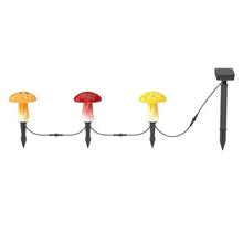 Linked solar mushroom landscape lights with red and yellow caps, and solar panel