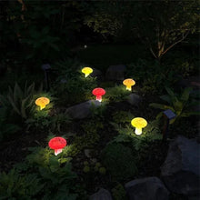 Solar mushroom landscape light set with red and yellow glowing caps and solar panels
