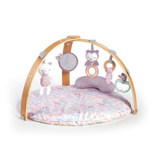 Reversible baby activity gym with wooden frame, hanging plush toys, and patterned round play mat