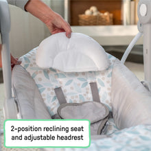 Reclining baby swing seat with adjustable headrest and plush white cover