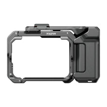 Action camera frame accessory with open center and side grip