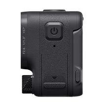 Action camera rear side with power button and textured rubber grip